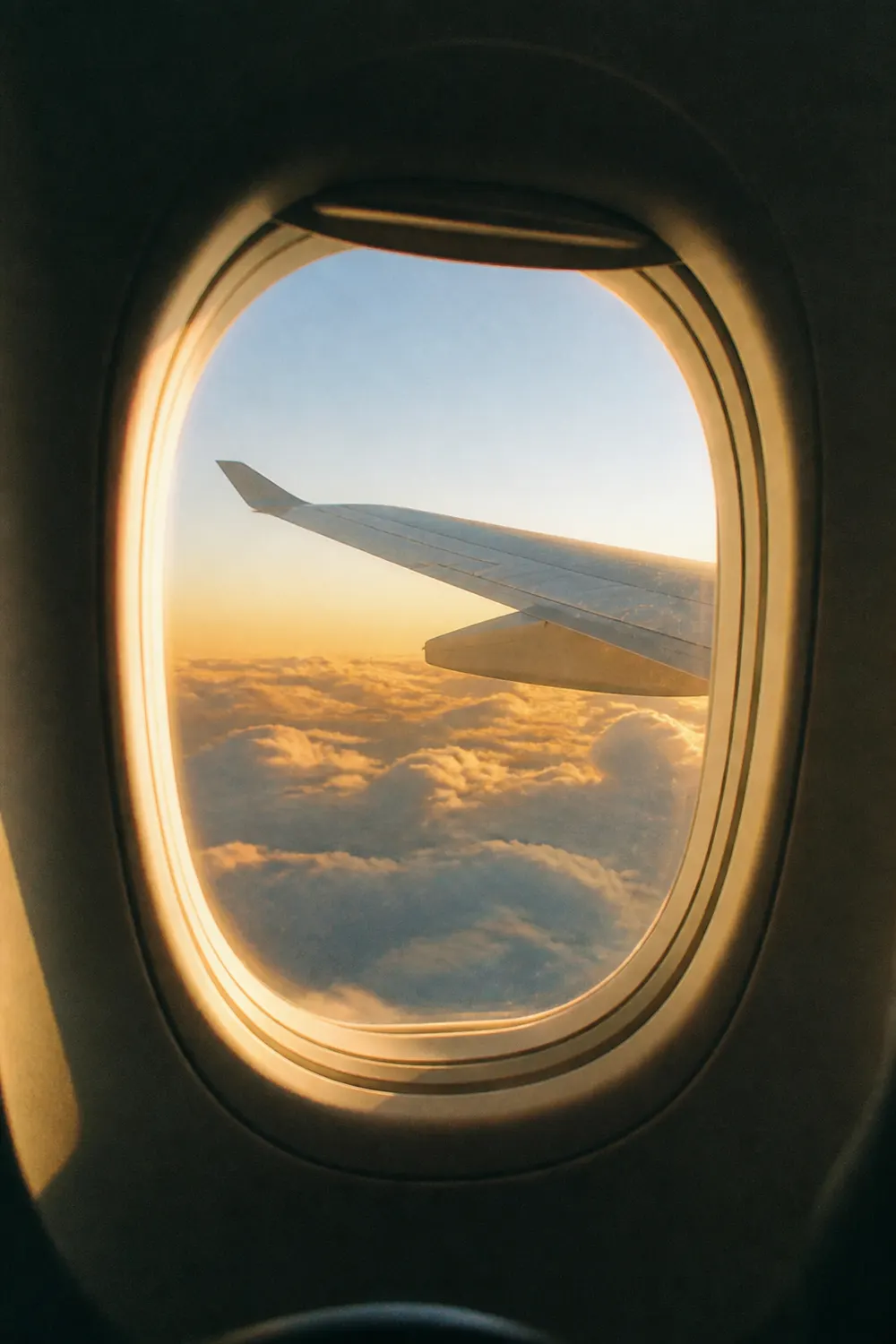 Sunlit airplane window, from travel work in the archive